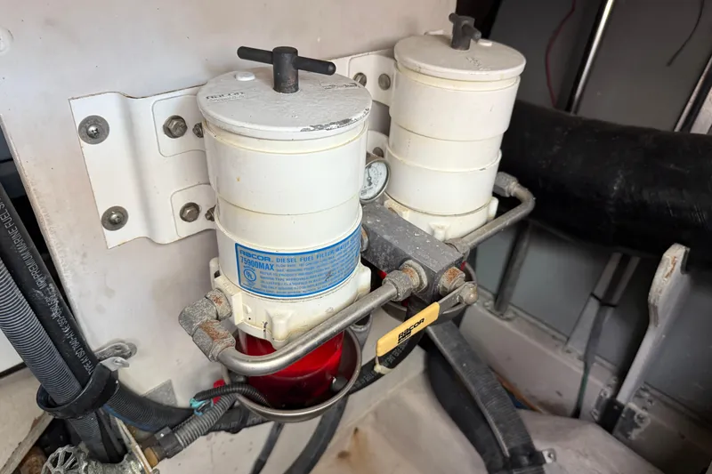 Slide: The Image of Diesel fuel filter system in 2006 Sea Ray 48 Sundancer engine room. - 99