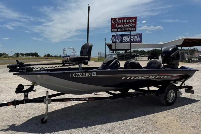 Slide: The Image of 2021 Tracker Pro Team 175 TF boat on trailer at outdoor dealership. - 10