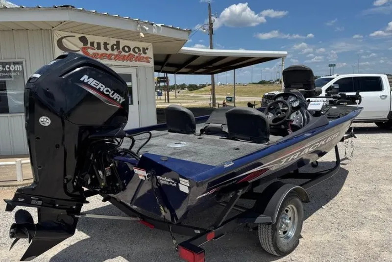 Slide: The Image of 2021 Tracker Pro Team 175 TF boat with Mercury engine at Outdoor Specialties. - 4