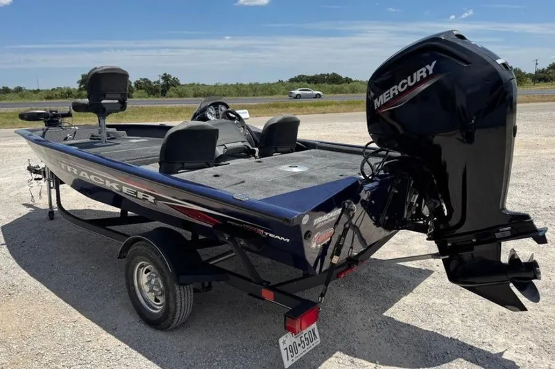 Slide: The Image of 2021 Tracker Pro Team 175 TF boat with Mercury engine on a trailer. - 8