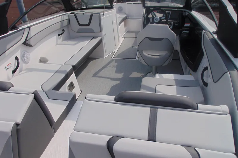 Slide: The Image of 2026 Yamaha Boats AR220 interior with sleek seating and modern design. - 13
