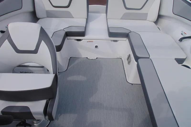Slide: The Image of 2026 Yamaha Boats AR220 interior with modern seating and sleek design. - 21