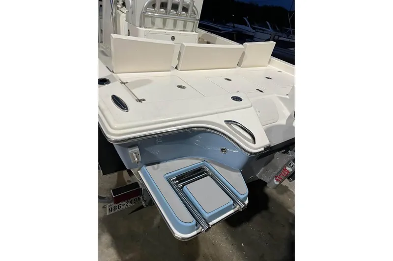 Slide: The Image of 2023 Pathfinder 2600 HPS boat stern with swim platform and ladder. - 20