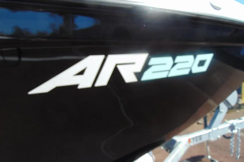 Slide: The Image of 2026 Yamaha Boats AR220 logo on sleek black hull. - 3