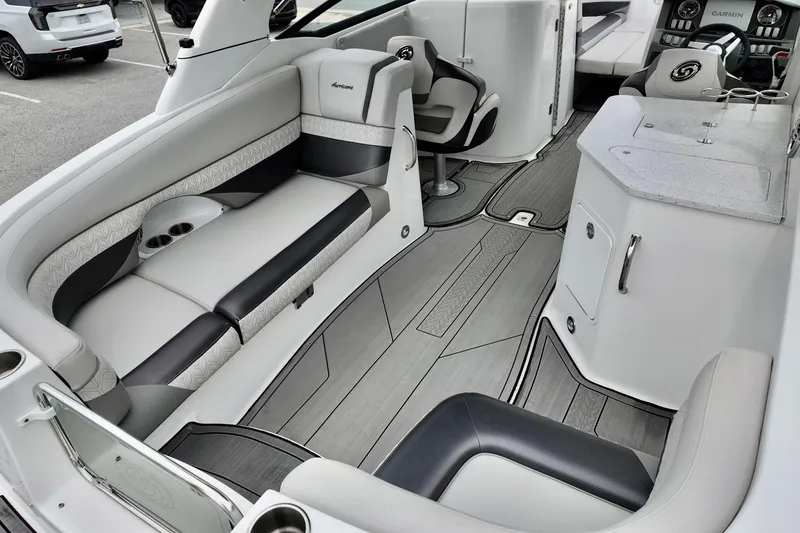 Slide: The Image of 2023 Hurricane Sun Deck 2690 interior with sleek seating and modern dashboard. - 5