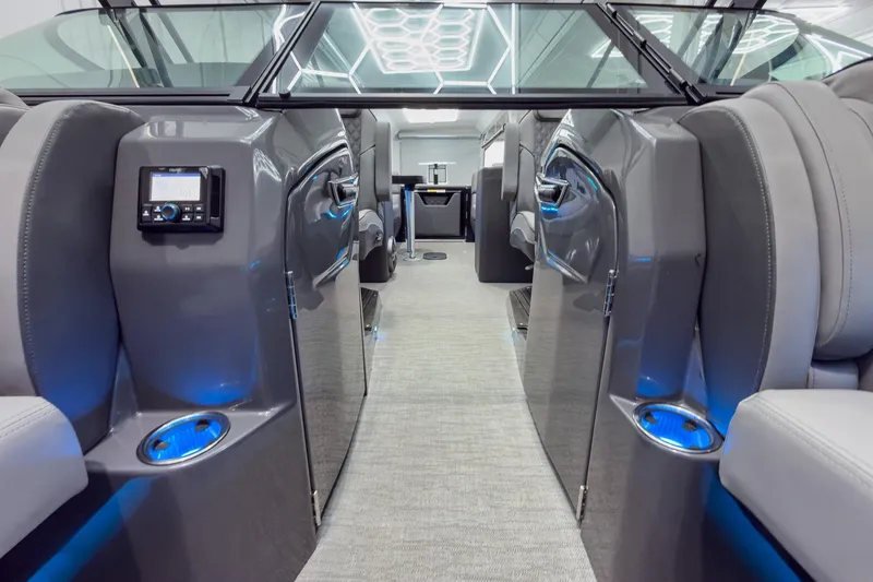 Slide: The Image of Luxurious interior of 2026 Godfrey Sanpan 27' Tritoon with modern seating and ambient lighting. - 18