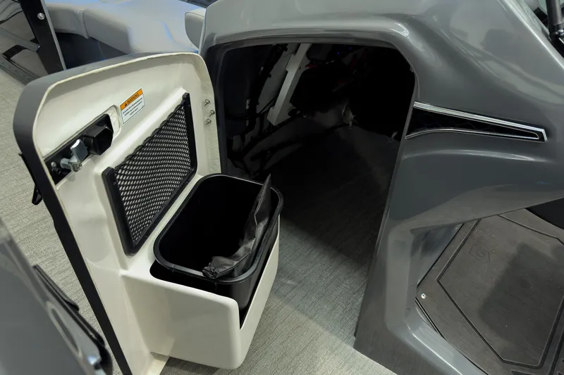Slide: The Image of Interior storage compartment of 2026 Godfrey Sanpan 27' Tritoon boat. - 32