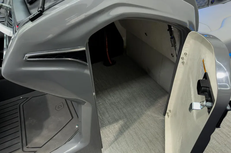 Slide: The Image of Open storage compartment on 2026 Godfrey Sanpan 27' Tritoon boat. - 33