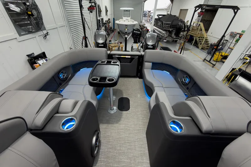 Slide: The Image of Luxurious interior of 2026 Godfrey Sanpan 27' Tritoon with modern seating and ambient lighting. - 35