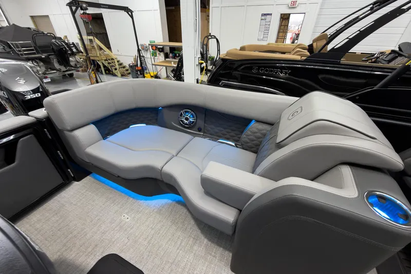 Slide: The Image of Luxurious seating on 2026 Godfrey Sanpan 27' Tritoon with ambient lighting and modern design. - 37