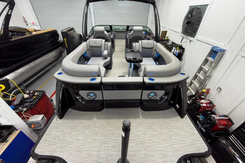 Slide: The Image of 2026 Godfrey Sanpan 27' Tritoon interior with luxurious seating and modern design. - 41