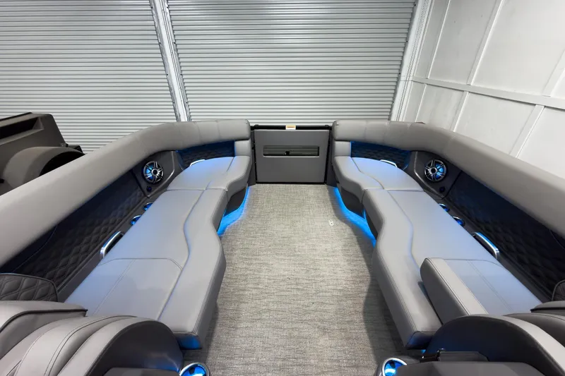 Slide: The Image of Luxurious interior of 2026 Godfrey Sanpan 27' Tritoon with LED lighting and plush seating. - 47