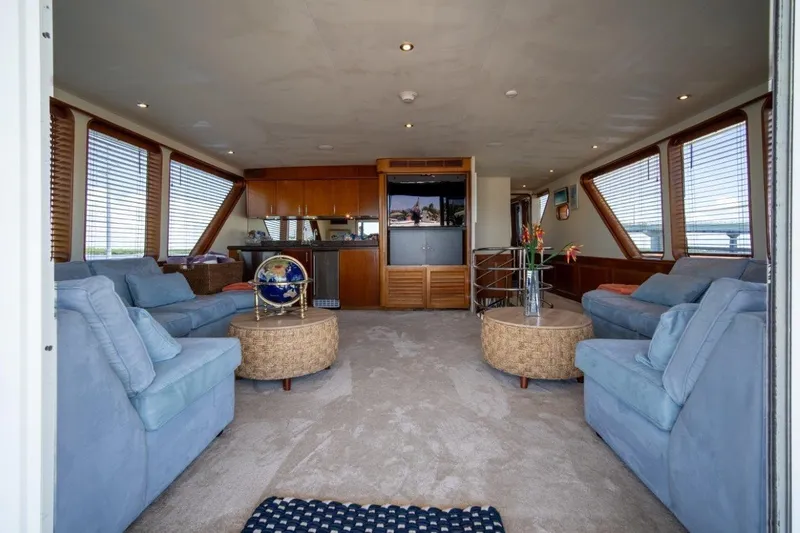 Slide: The Image of Luxurious 1984 Lloyds Ships Tri-Deck yacht interior with plush seating and elegant decor. - 11