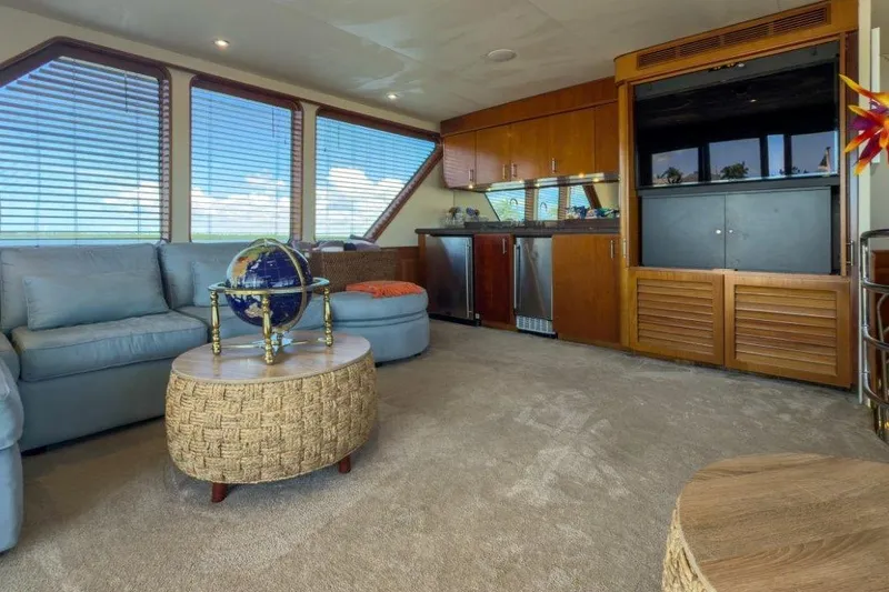 Slide: The Image of Luxurious 1984 Lloyds Ships Tri-Deck yacht interior with plush seating and elegant decor. - 13