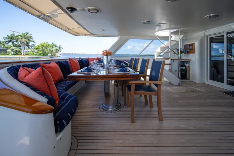 Slide: The Image of Luxurious 1984 Lloyds Ships Tri-Deck yacht deck with elegant dining area and ocean view. - 20