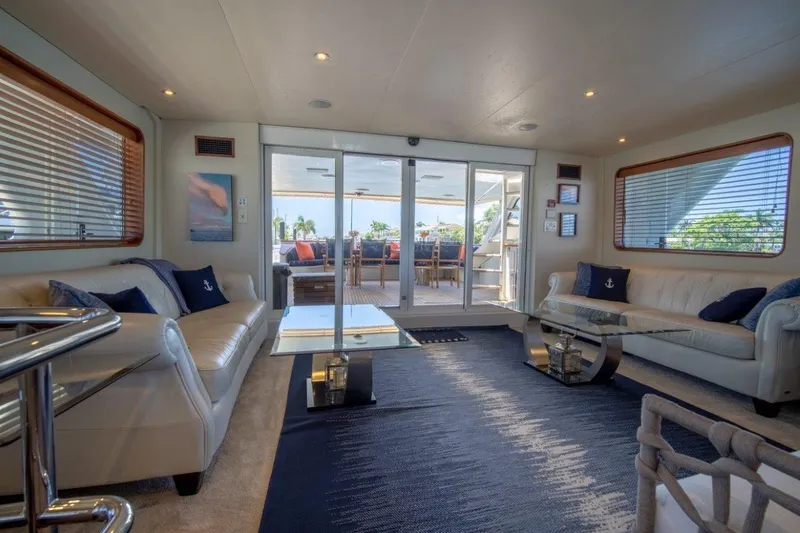Slide: The Image of Luxurious 1984 Lloyds Ships Tri-Deck yacht interior with elegant seating and glass doors. - 22
