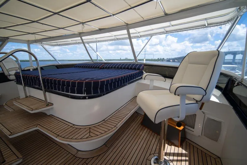 Slide: The Image of Luxurious 1984 Lloyds Ships Tri-Deck yacht interior with seating and sunbed under canopy. - 3