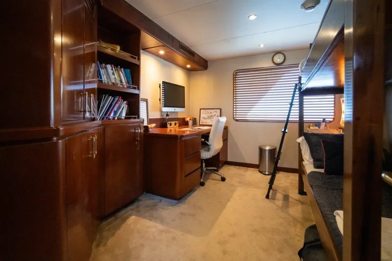 Slide: The Image of Luxurious 1984 Lloyds Ships Tri-Deck cabin with wooden furnishings and modern amenities. - 56