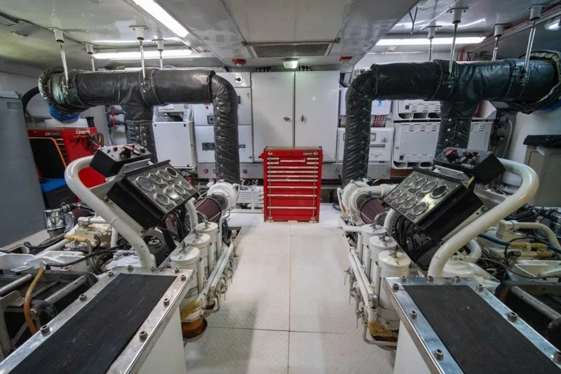 Slide: The Image of Engine room of 1984 Lloyds Ships Tri-Deck yacht with machinery and control panels. - 58
