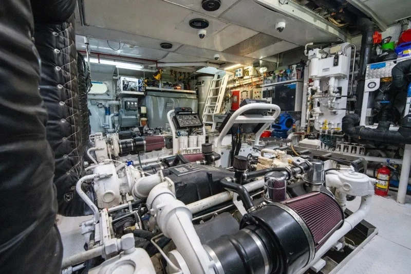 Slide: The Image of Engine room of 1984 Lloyds Ships Tri-Deck yacht, showcasing complex machinery and equipment. - 59