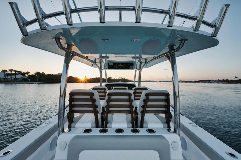 Slide: The Image of 2025 Mag Bay 43 CC boat interior at sunset on the water. - 16