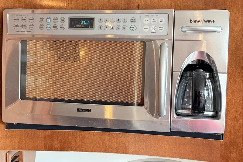 Slide: The Image of Kenmore microwave and coffee maker combo in a 2007 Carver 36 Mariner yacht. - 23
