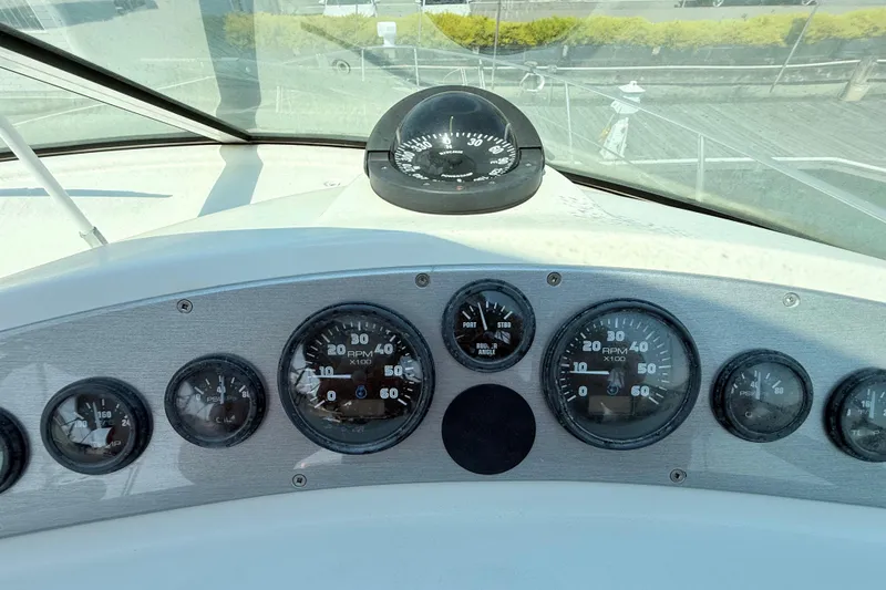 Slide: The Image of Dashboard of 2007 Carver 36 Mariner boat with gauges and compass. - 6