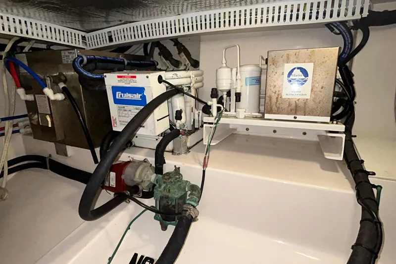 Slide: The Image of Engine room of 2008 Cabo Yachts Sportfish 35 with Cruisair system and Glacier refrigeration. - 24