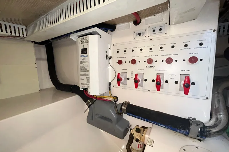Slide: The Image of Electrical panel and components inside a 2008 Cabo Yachts Sportfish 35 boat. - 25