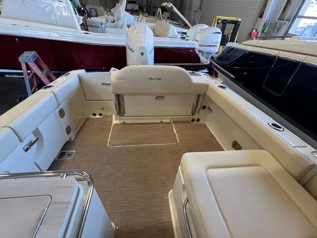 Slide: The Image of 2022 Chris-Craft Calypso 24 boat interior with spacious seating and storage. - 10