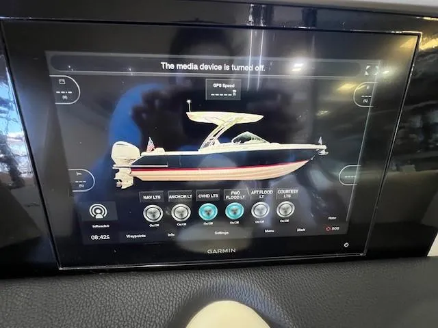 Slide: The Image of Garmin display showing 2022 Chris-Craft Calypso 24 boat controls and settings. - 20