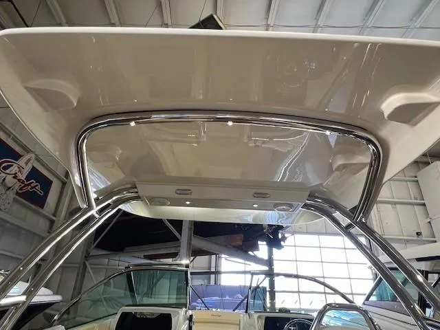 Slide: The Image of 2022 Chris-Craft Calypso 24 boat interior with hardtop and stainless steel frame. - 21