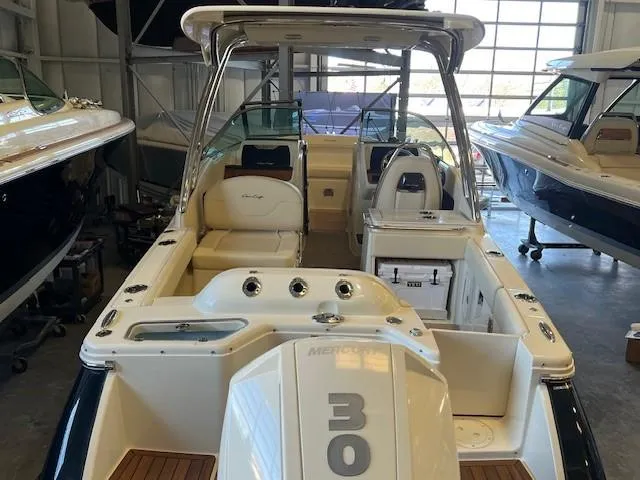 Slide: The Image of 2022 Chris-Craft Calypso 24 boat interior with Mercury 300 outboard engine. - 5