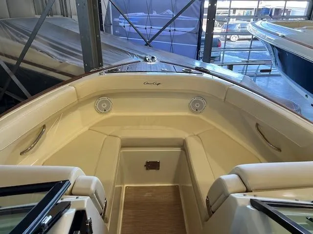 Slide: The Image of 2022 Chris-Craft Calypso 24 boat interior with seating and speakers. - 8