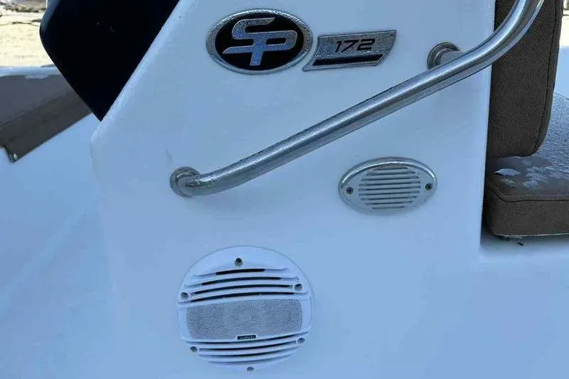 Slide: The Image of 2024 Sea Pro 172 Bay boat console with speakers and logo detail. - 11