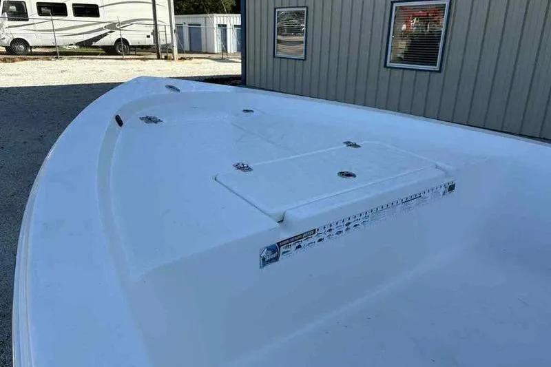 Slide: The Image of 2024 Sea Pro 172 Bay boat deck, white surface, outdoor setting. - 8