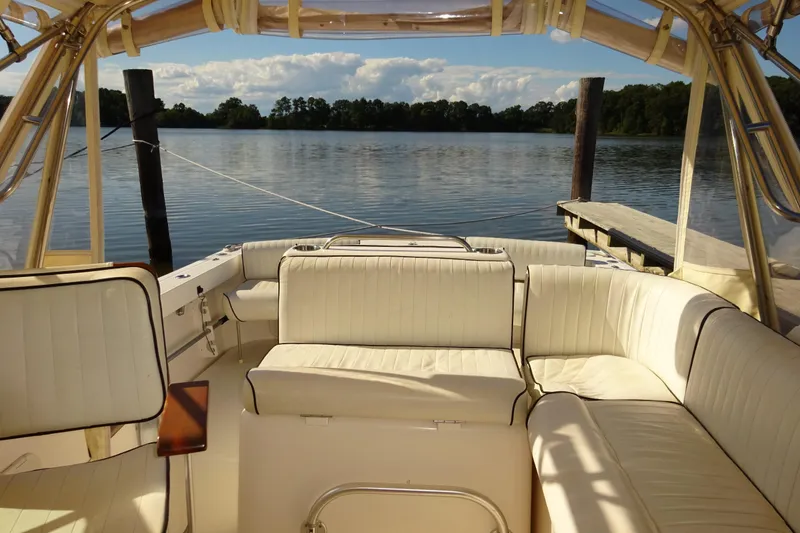 Slide: The Image of Luxurious interior of 2007 Hunt Yachts Surfhunter 29, docked by serene waters. - 36