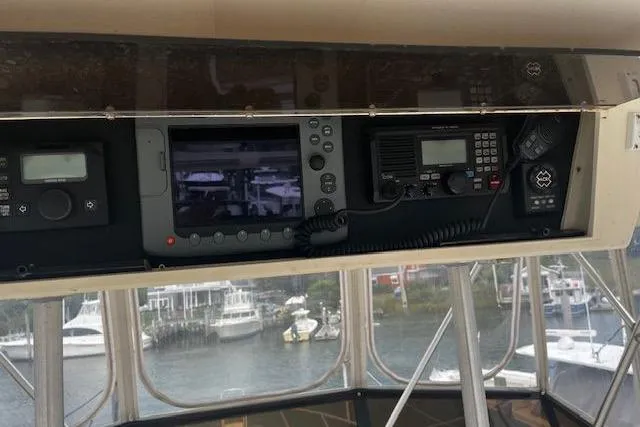 Slide: The Image of Control panel of 1988 Viking 45 Convertible boat with navigation and communication equipment. - 31