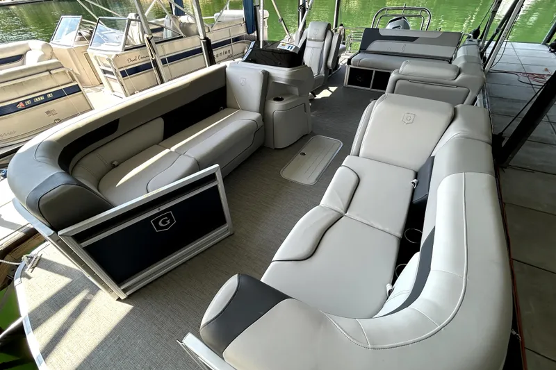 Slide: The Image of Interior of 2025 Godfrey SWEETWATER 2286 SFL pontoon boat with luxurious seating. - 13