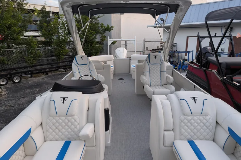 Slide: The Image of Luxurious 2026 Trifecta 25 RF SS Arch pontoon boat with elegant seating and modern design. - 10