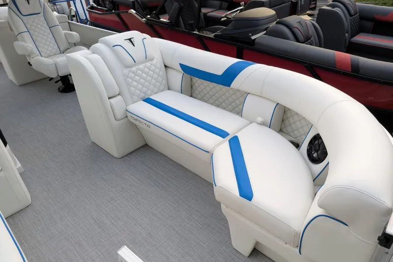 Slide: The Image of Luxurious interior of 2026 Trifecta 25 RF SS Arch boat with white and blue seating. - 12