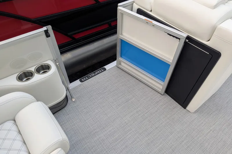 Slide: The Image of Interior of 2026 Trifecta 25 RF SS Arch boat with cup holders and storage compartment. - 14