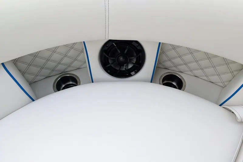 Slide: The Image of Luxury seating with speaker and cup holders on 2026 Trifecta 25 RF SS Arch boat. - 16