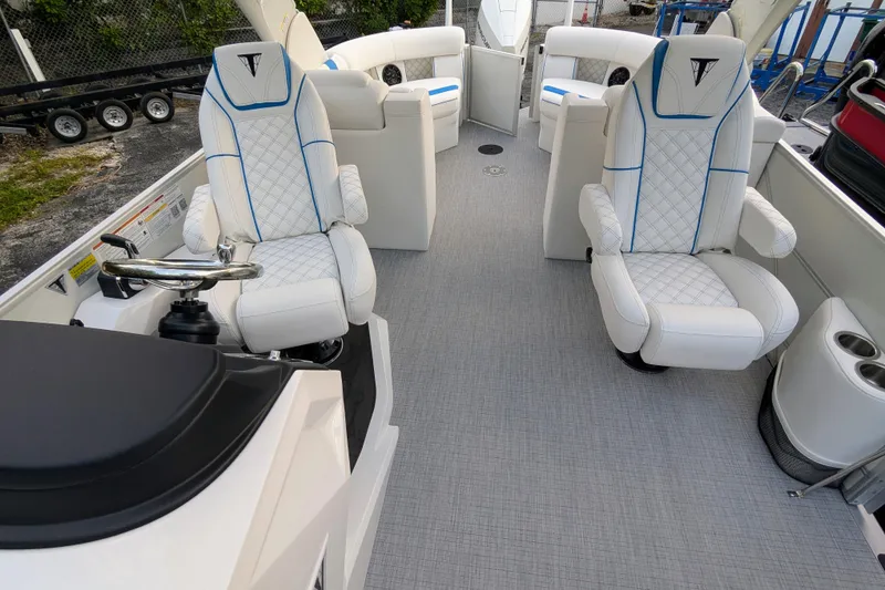 Slide: The Image of Luxurious interior of 2026 Trifecta 25 RF SS Arch pontoon boat with plush seating. - 8
