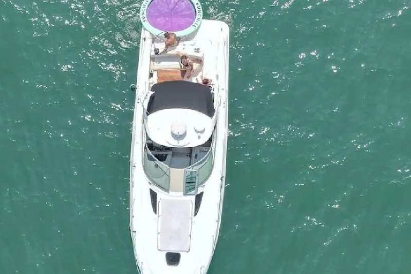 Slide: The Image of Aerial view of 2008 Sea Ray 350 Sundancer yacht on turquoise water. - 3