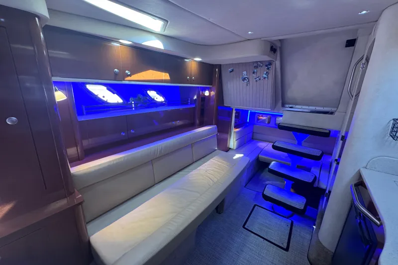 Slide: The Image of Luxurious interior of 2008 Sea Ray 350 Sundancer yacht with modern lighting and seating. - 41