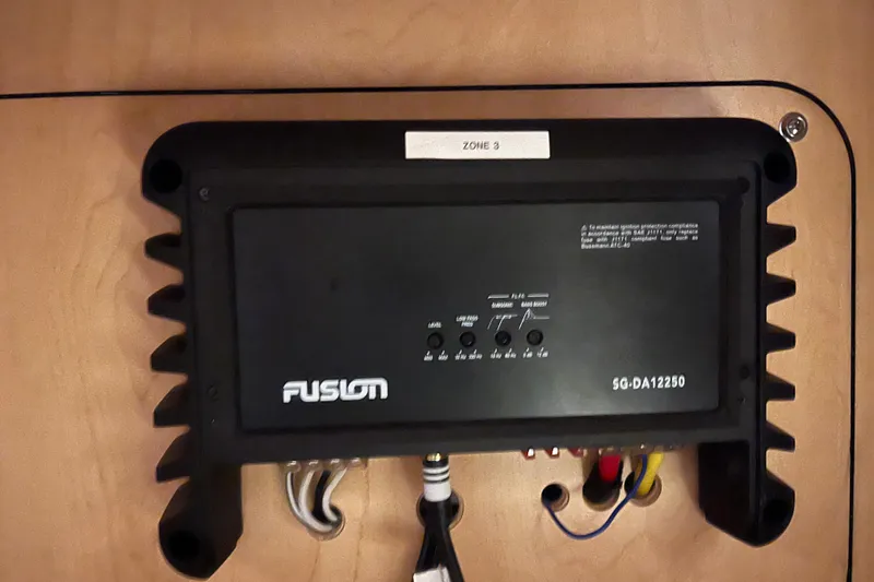 Slide: The Image of Fusion audio amplifier installed on 2008 Sea Ray 350 Sundancer boat, labeled Zone 3. - 51