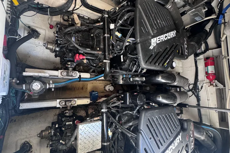 Slide: The Image of Engine room of a 2008 Sea Ray 350 Sundancer with Mercury engines. - 67