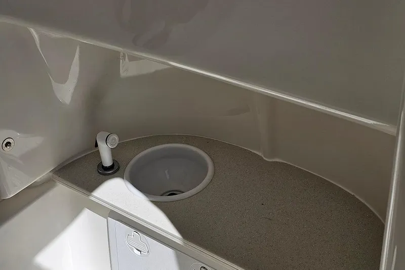 Slide: The Image of Interior sink area of 2026 Sea Pro 242 Center Console Sport boat. - 28