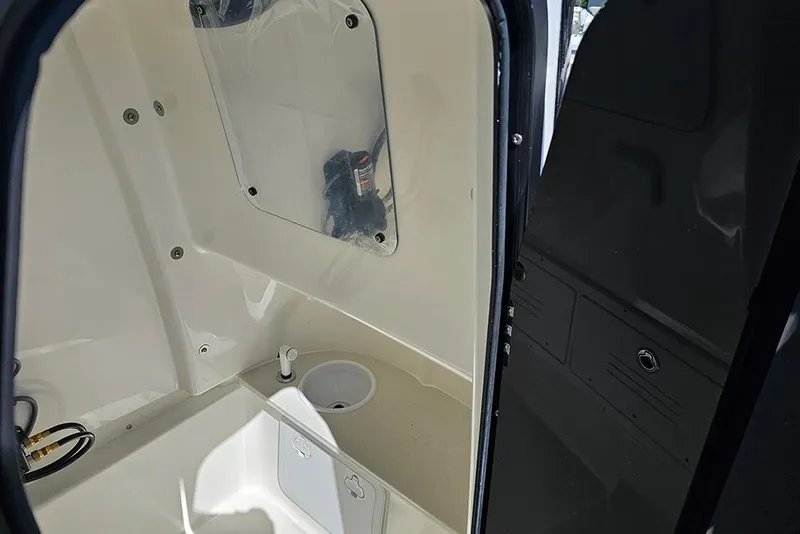 Slide: The Image of Interior view of 2026 Sea Pro 242 Center Console Sport boat cabin. - 29